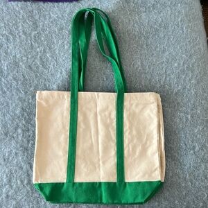 NWOT Set of two zipper-top tote bags, green and white with interior pocket